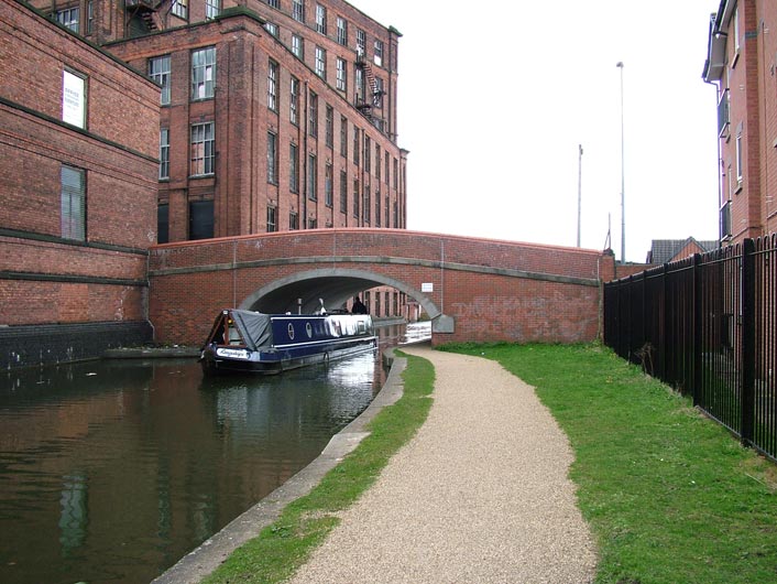 A boat passes under Mather Lane bridge (Bridge 65)