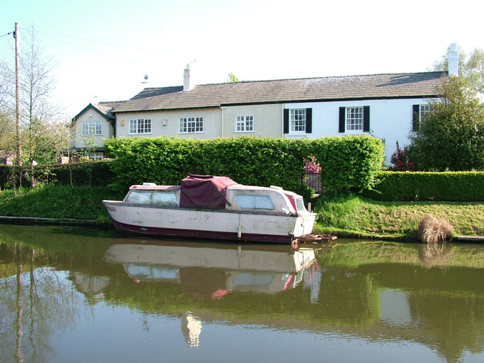 Canalside housing and a boat