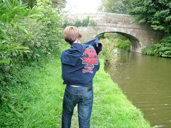 Thomas getting in a tangle with his t-shirt