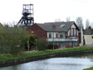 Pithead gear at Astley Green colliery Pithead gear at Astley Green colliery
