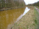 Rusty orange coloured canal